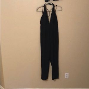 Black plunge necklace jumpsuit by Missguided